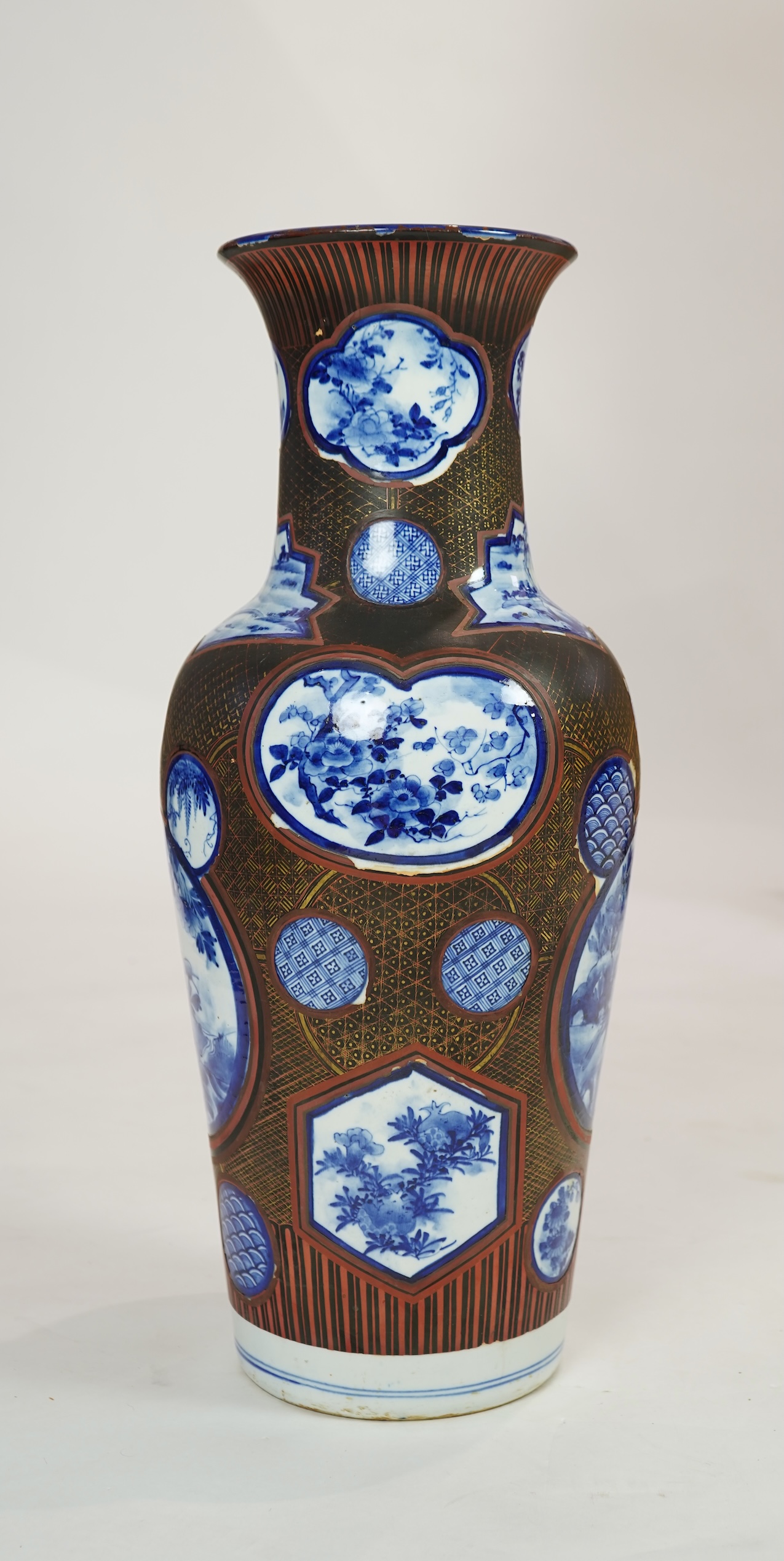 A large Japanese blue and white and gilt lacquered vase, late 19th century
